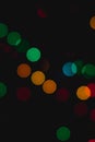 Bokeh of colored round festive Christmas lights