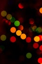 Bokeh of colored round festive Christmas lights