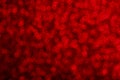 Bokeh defocused light for overlay. Magic red illuminated lighting. Glittering surface with glow effect Royalty Free Stock Photo