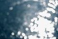 Bokeh effect.The bokeh of the lens from the surface of the water shimmering in the sunlight. The reflections create a pattern of Royalty Free Stock Photo