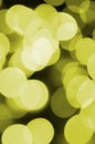 Bokeh effect golden yellow defocused light background. Christmas Lights Concept Royalty Free Stock Photo