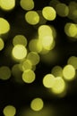 Bokeh effect golden yellow defocused light background. Christmas Lights Concept Royalty Free Stock Photo