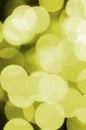 Bokeh effect golden yellow defocused light background. Christmas Lights Concept Royalty Free Stock Photo