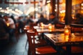 Bokeh effect in a restaurant, customers dining in the background