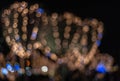 Bokeh for a festive New Year and Christmas background. Defocused abstract beige and blue light circles. Royalty Free Stock Photo
