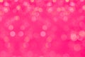 Bokeh glamour pink background with blurred rainbow lights. Royalty Free Stock Photo