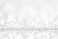 Bokeh gray background. Silver abstract bokeh snow falling winter christmas holiday background Royalty Free Stock Photo