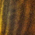 Bokeh light of gold glitters. Golden glitter texture background. Sparkling glitter wrapping paper with sequins and sparkles. Royalty Free Stock Photo