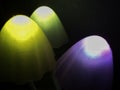 Bokeh lights abstract background in dark night colors. Photo. Large multi-colored round glare from headlights or lamps of red, Royalty Free Stock Photo