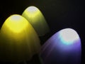 Bokeh lights abstract background in dark night colors. Photo. Large multi-colored round glare from headlights or lamps of red, Royalty Free Stock Photo