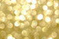 Bokeh lights. Abstract magical golden blurred background. Celebration, Christmas concept. Royalty Free Stock Photo