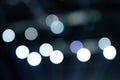 bokeh lights. blurred night white blue gray abstract texture glowing neon light on black background Royalty Free Stock Photo