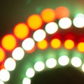 Bokeh lights curls. Festive background of retro colors