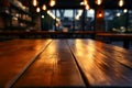 Bokeh lit cafe ambiance, detailed view of a wooden table surface
