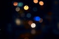 Bokeh, night and light on a window with water drops, liquid or moisture against a dark abstract background. Blurred Royalty Free Stock Photo
