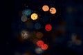 Bokeh, night and lights on a window with water drops, liquid or moisture against a dark abstract background. Blurred Royalty Free Stock Photo