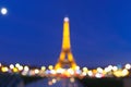 Bokeh photo of Eiffel Tower at night in Paris Royalty Free Stock Photo