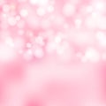 Bokeh pink and white sparkling lights festive background with te