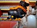 Bokeh shot of the Shivalingam of Lord Shiva with his vehicle called Nandi with selective focus.