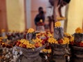 Bokeh shot of the Shivalingam of Lord Shiva with his vehicle called Nandi with selective focus.