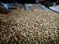 Bokeh shot of small seeds used for Hindu rituals is being sold in a grocery store in India Royalty Free Stock Photo