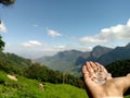 Bokeh shot of the transparent Shivalingam of lord Shiva with selective focus and mountains background. Beautiful landscape in