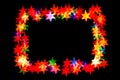 Bokeh stars isolated on a black background stars of different colors form a frame