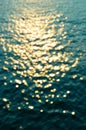 Bokeh of sun reflections on sea water Royalty Free Stock Photo