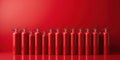 A Bold Array of Red Fire Extinguishers Against a Scarlet Backdrop Safety Meets Modern Design Royalty Free Stock Photo