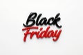 Bold black friday text in shiny red and black lettering isolated on white background Royalty Free Stock Photo