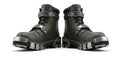 Bold black leather platform boots with silver buckles and metal toe caps command attention Royalty Free Stock Photo