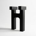 Black 3D Letter H with Sharp Edges and Soft Shadows on a White Background alphabet font Royalty Free Stock Photo