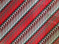 A bold modern Indonesian Batik pattern in striking red, black, and white Royalty Free Stock Photo