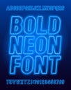 Bold neon alphabet font. Blue color light bulb oblique letters and numbers.