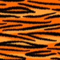 Bold orange and black tiger skin striped animal print, seamless pattern, vector Royalty Free Stock Photo