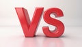 Bold red \'VS\' letters symbolizing a versus or competition concept. Royalty Free Stock Photo