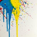Bold splashes of blue, yellow, and red paint streak and drip across a white canvas Royalty Free Stock Photo