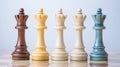 Bold And Vibrant Wooden Chess Kings On Blue Sky Background Royalty Free Stock Photo