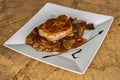 Pork fillet with boletus and Gravy sauce. And a sprig of rosemary. Royalty Free Stock Photo