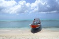 Boat in the shoreline of Cayo Bolivar, in Colombia Royalty Free Stock Photo
