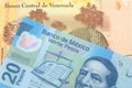 A bolivar note from Venezuela with a twenty peso note from Mexico