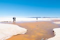 Bolivia Colchani hikers in the Salar of Uyuni