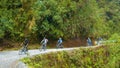 Bolivia cyclists on death road to Coroico Royalty Free Stock Photo