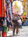 BOLIVIA, POTOSI, 21 JULY 2008: Cotton candy seller in the streets of La Paz, Bolivia, South America