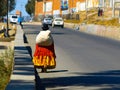 Bolivian cholita walking on the street of El Alto Royalty Free Stock Photo