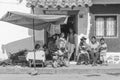 Bolivian family selling food on the sidewalk