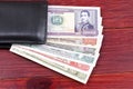 Bolivian money in the black wallet