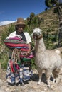 Bolivian woman with her Llama - Sun Island - Bolivia