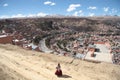 Bolivian woman and mountain view of La Paz, Bolivia Royalty Free Stock Photo