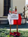 Bolkow, Poland - August 08, 2021. Catholic church of Saint Jadwiga in Main square with alcohol bottles and message Be sober Royalty Free Stock Photo